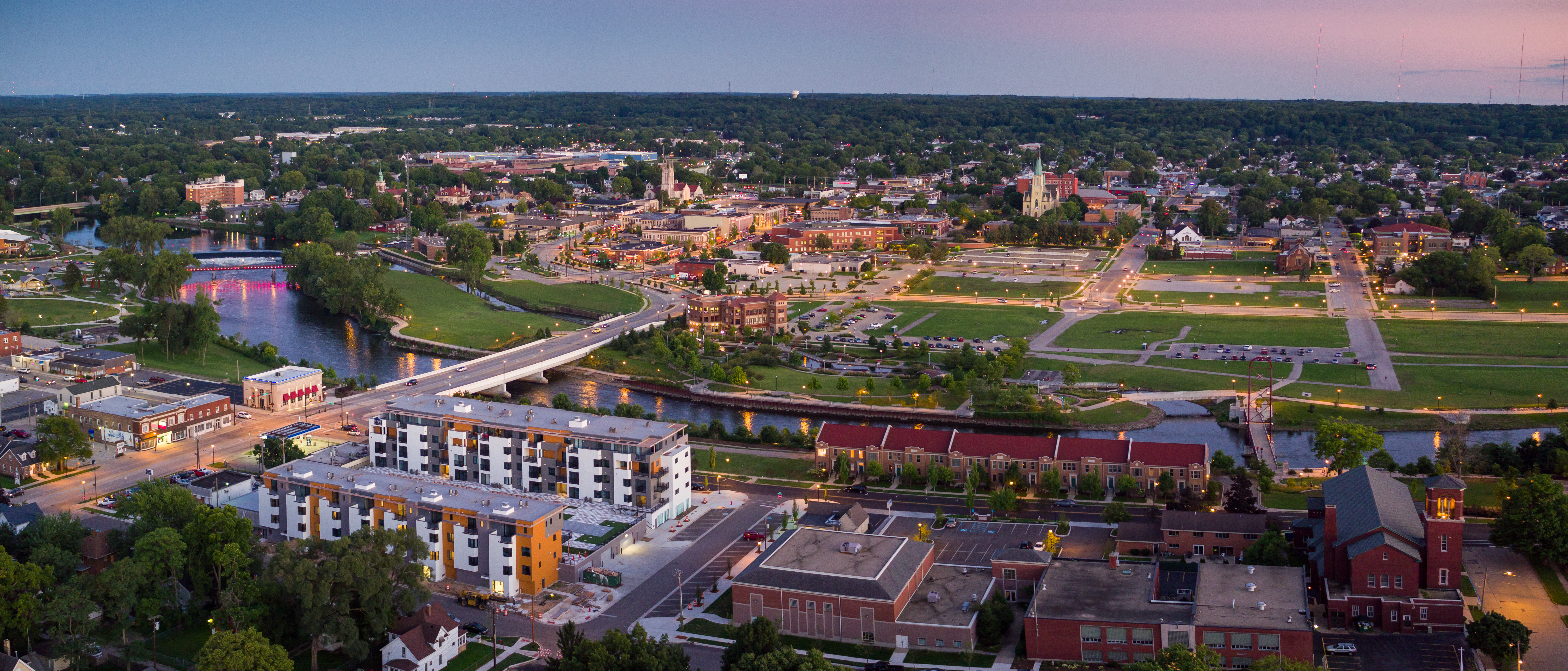 What there is now — a riverfront downtown, built up around the building everyone thought missed the plot.
